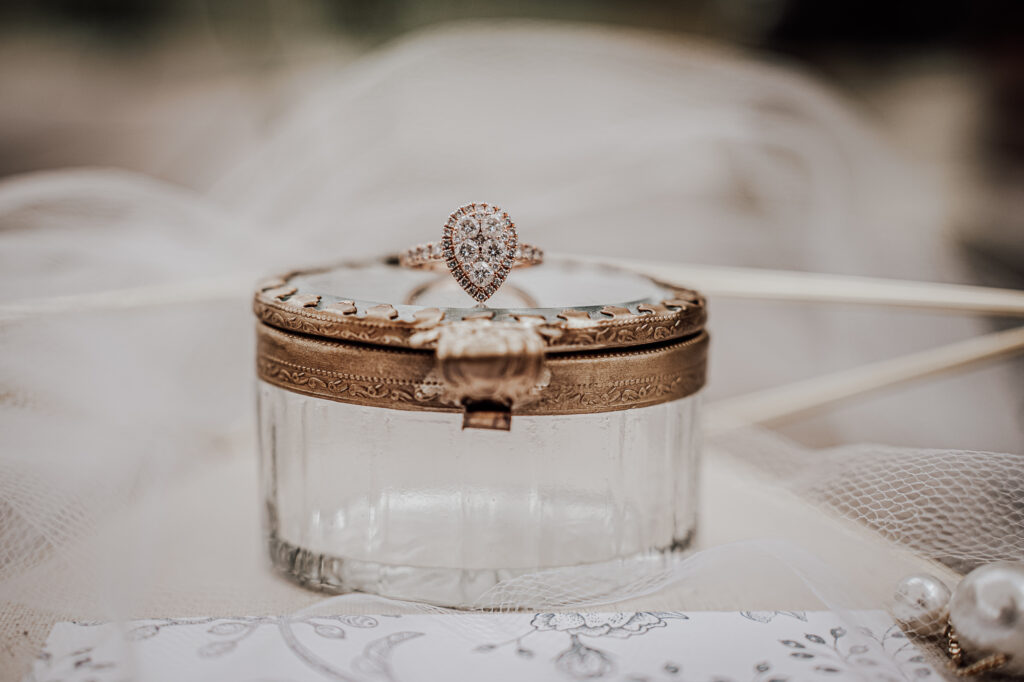 Wedding Ring On A Vintage Glass Box