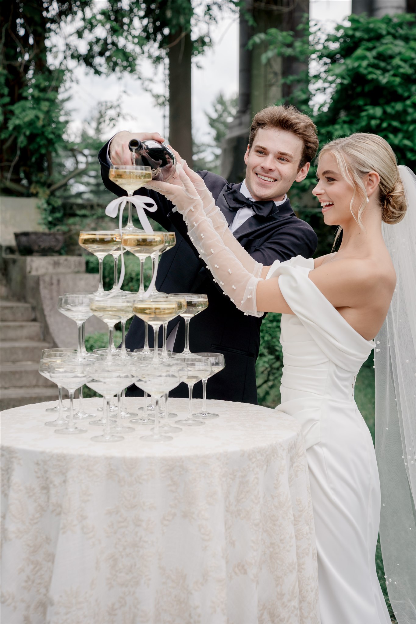 Elegant Bridal Couple With Champagne Tower